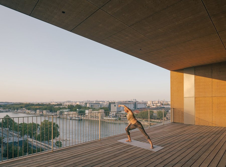 The facade's void provides an outdoor terrace for exercise, socialising and relaxation.